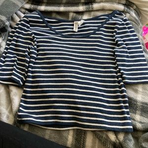 here I’m selling this blue stripped crop top